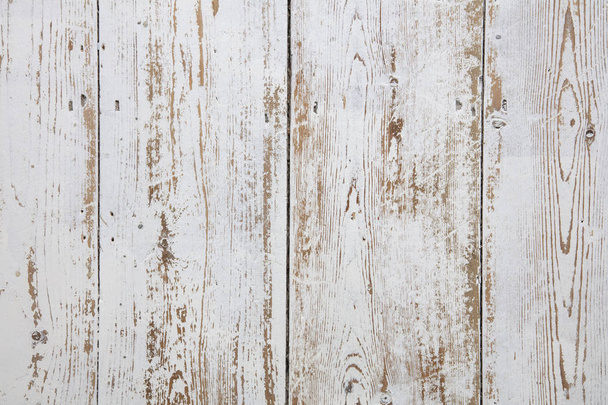 White wooden floorboards. Distressed worn floorboard background painted white - Foto, Imagem