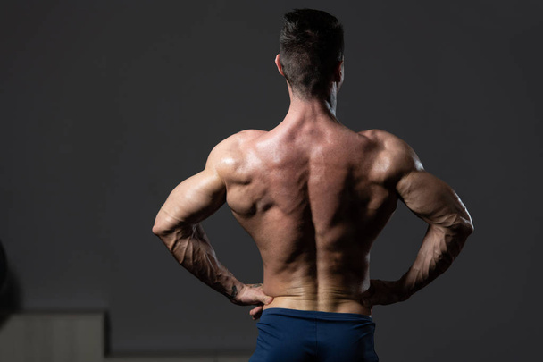 Physically Man Showing His Well Trained Back - Photo, Image