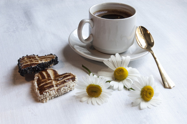 Wedding cookies with a cup of coffee - Photo, Image