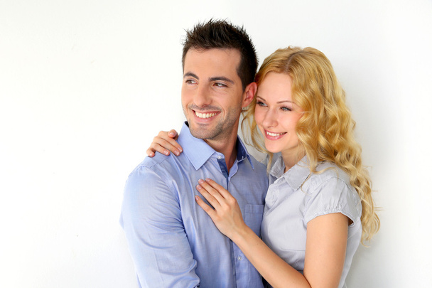 Portrait of cheerful couple on white background - Foto, afbeelding