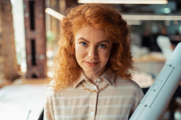 Woman with brassy curly hair wearing stylish necklace - Fotografie, Obrázek