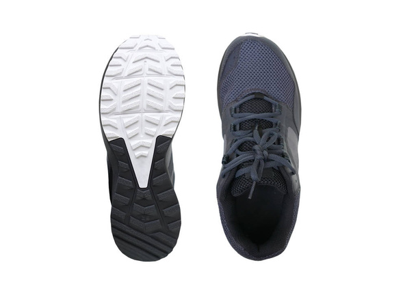 A pair of trail running shoes isolated on white background     - Photo, Image