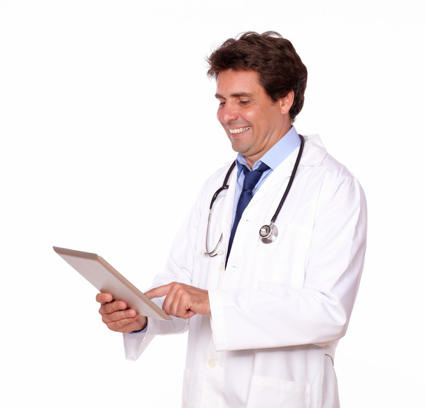 Medical doctor working on tablet pc - Фото, зображення
