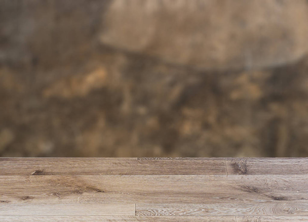 blank wooden table. Flooring. The wall of the old house. Cracks  - Fotó, kép