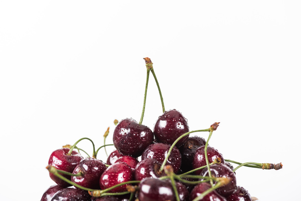 red, fresh, whole and ripe cherries covered with water drops  - Valokuva, kuva