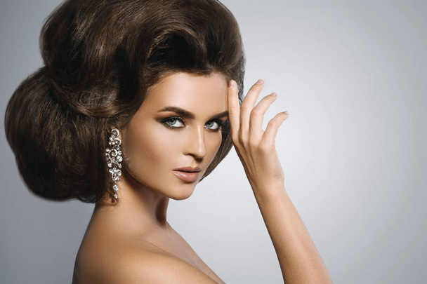 Gorgeous woman with a beautiful hairstyle and make-up - Photo, Image