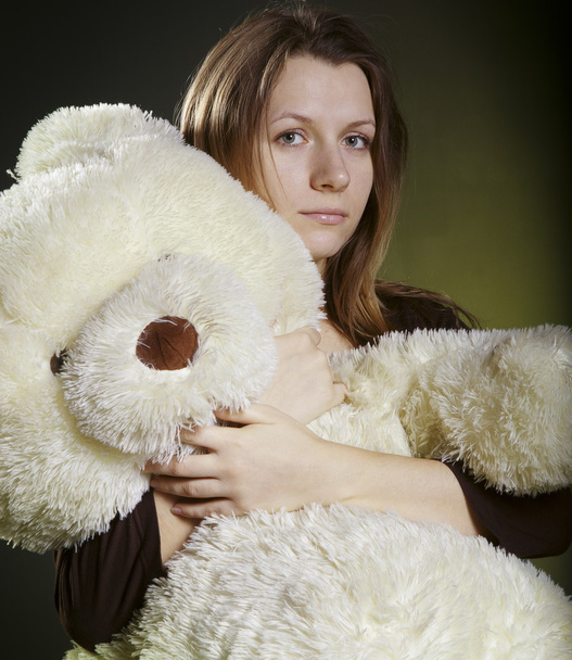 Portrait of girl with a toy - Foto, afbeelding
