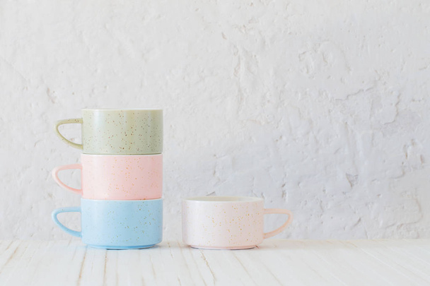 modern ceramic cups on background white wall - Photo, Image