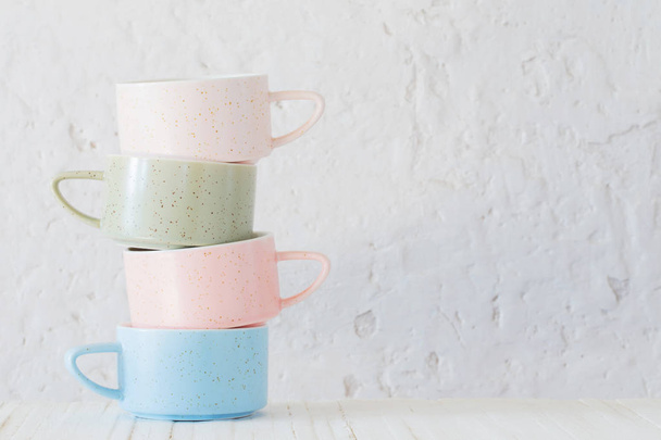 modern ceramic cups on background white wall - Foto, Bild