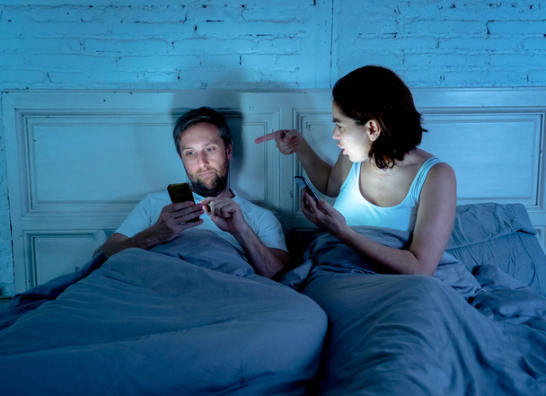 Lifestyle of mobile addicted man husband and angry frustrated wife woman feeling ignored and upset in Internet, Social media Games and Technology addiction and Relationship communication problems. - Foto, imagen