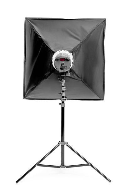 studio equipment flash with a square soft box on the rack on a w - Photo, Image
