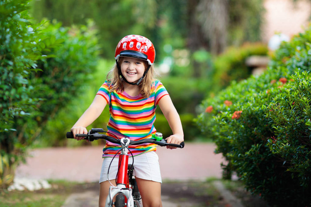 Kids on bike. Child on bicycle. Kid cycling. - Fotó, kép