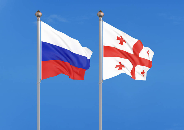 Ρωσία vs γεωργία. Πυκνές έγχρωμες μεταξένια σημαίες της Ρωσίας και της γεωργίας. εικονογράφηση 3D στο φόντο του ουρανού εικόνα - Φωτογραφία, εικόνα