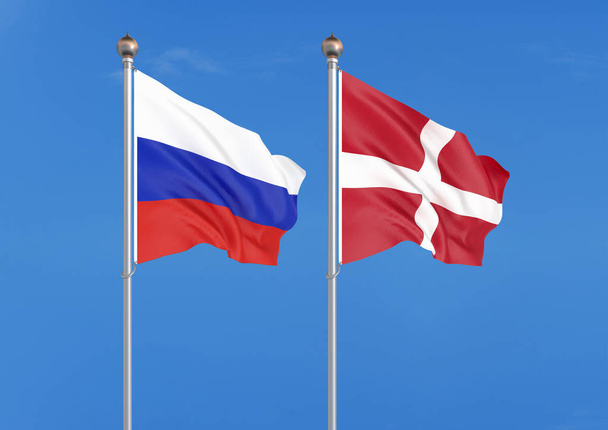 ロシア vs デンマーク.ロシアとキプロスの厚い色の絹のような旗。空の背景イラストに3Dイラスト - 写真・画像