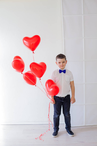 beautiful children with red heart balloons nice - Photo, Image