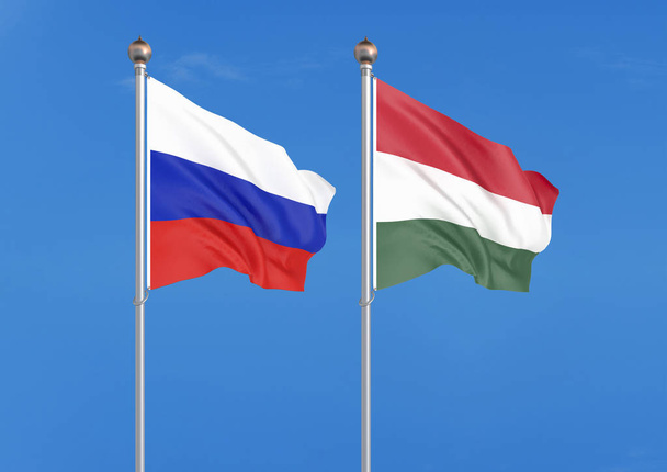 ロシア vs ハンガリー.ロシアとハンガリーの厚い色の絹のような旗。空の背景イラストに3Dイラスト - 写真・画像