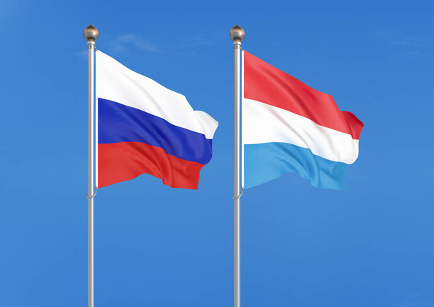 Ρωσία vs Λουξεμβούργο. Πυκνές χρωματιστές μεταξένια σημαίες της Ρωσίας και του Λουξεμβούργου. εικονογράφηση 3D στο φόντο του ουρανού εικόνα - Φωτογραφία, εικόνα