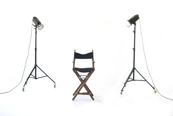 Ready photo shoot setup in white background in the studio. Photography Studio with Empty Chair - Photo, Image