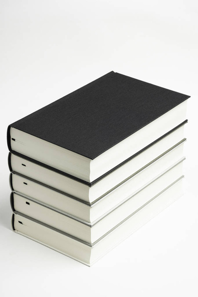 A Set Of Neatly Stacked Monochromatic Cloth Bound Books - Photo, Image