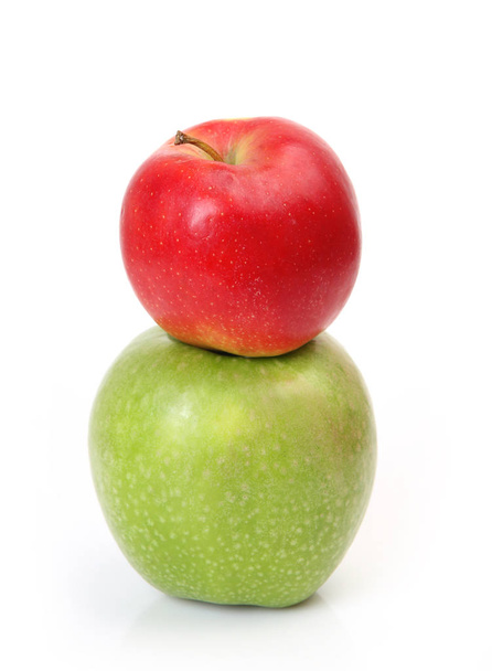 two green and red apples on a white background - Foto, Imagen