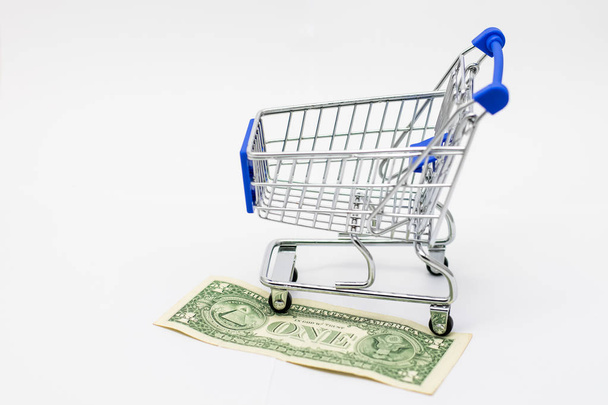 Dollar in Shopping Cart - 写真・画像