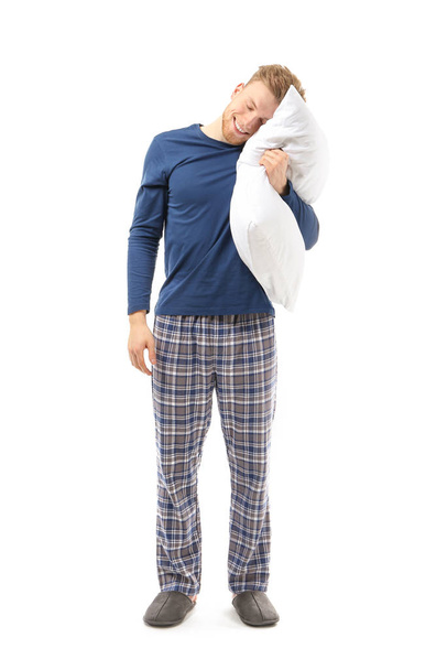 Сонный человек с подушкой на белом фоне
 - Фото, изображение