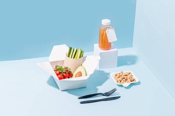 Fresh vegetables in compostable hot food paper containers with juice and nuts - 写真・画像
