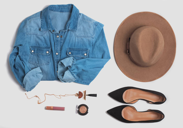 Creative composition with denim shirt, shoes and other accessori - Foto, Imagen