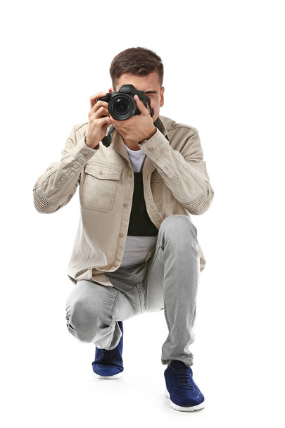 Male photographer on white background - Foto, afbeelding