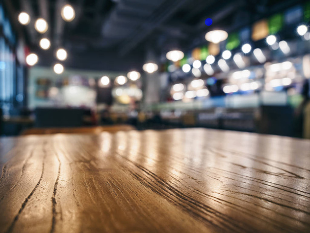Table top wooden counter Blur Bar cafe restaurant background - Photo, Image