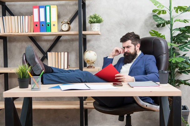 Owner of small business. Man bearded businessman sit office read business report. Analyzing financial report. Accounting and banking. Guy banker accountant learn indicators markers. Financial report - Fotografie, Obrázek