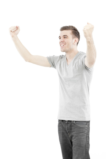 Casual man enjoying his success isolated on white background - Фото, изображение