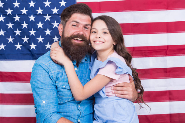 Father american bearded hipster and cute little daughter with USA flag. Freedom fundamental right. How do americans celebrate independence day. Independence is happiness. Independence day holiday - Foto, Bild