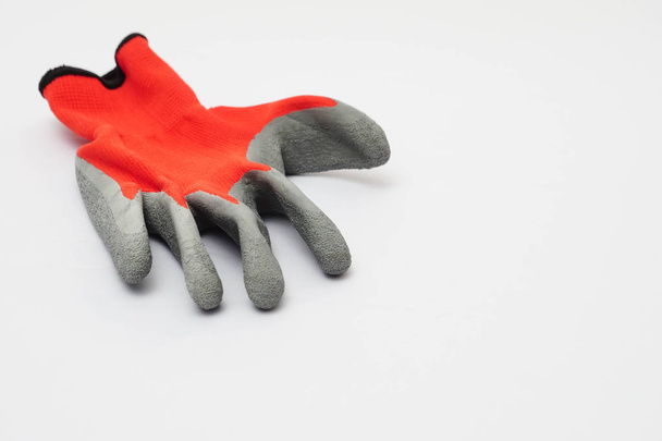 Red protective glove isolated on white background  - Photo, Image