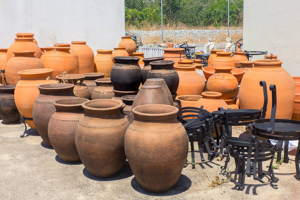 Many big clay vases outside at pottery shop - Photo, Image