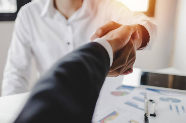 Partnership. two business people shaking hand after business signing contract in meeting room at company office, job interview, investor, success, negotiation, partnership, teamwork, financial concept - Fotoğraf, Görsel