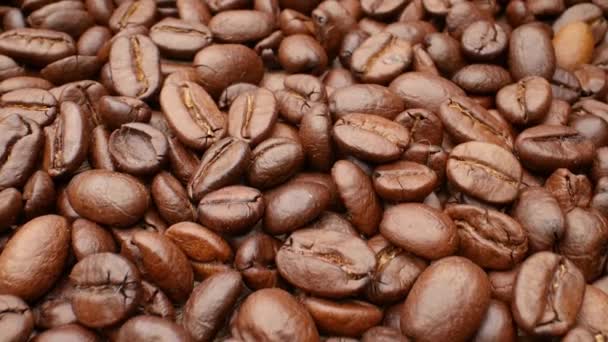 Close-up, smooth moving roasted coffee beans - Footage, Video