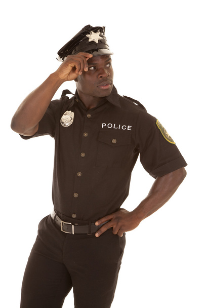Police officer look back - Foto, Imagen