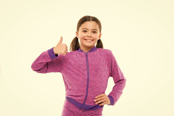 This is awesome. Girl cute child show thumbs up gesture. Gifts your teens will totally love. Kid show thumbs up. Girl happy totally in love fond of or highly recommend. Thumbs up approvement - Photo, Image