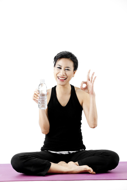 Sports woman drinks water - Photo, image