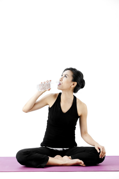 Sports woman drinks water - Fotoğraf, Görsel