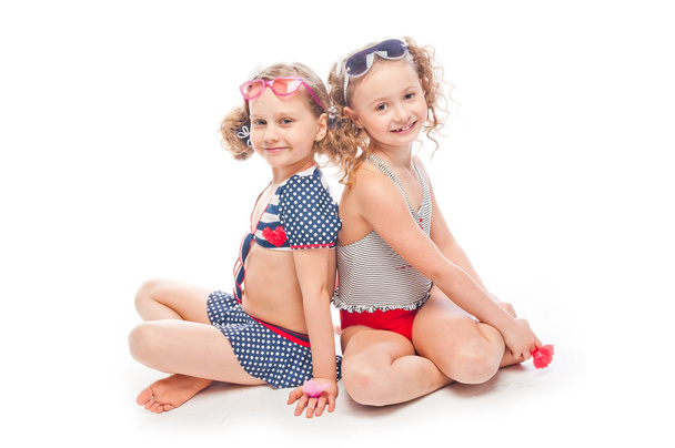 Two girls in bathing suits - Foto, imagen