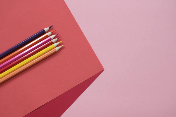 Abstract geometric paper background with color pencils. School and education concept. - Fotografie, Obrázek