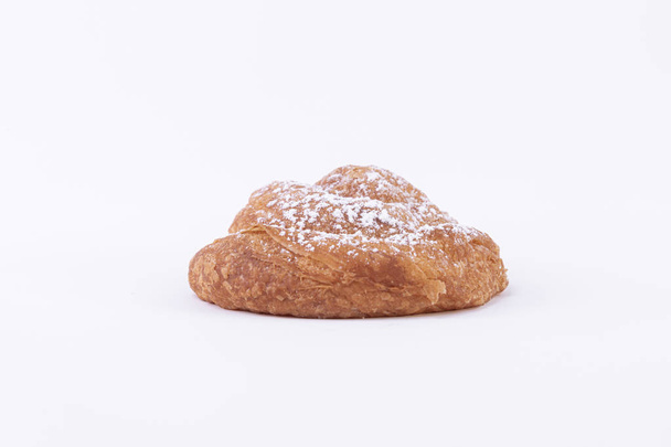 Bread made with freshly baked puff pastry dough with powdered sugar on top - Photo, Image
