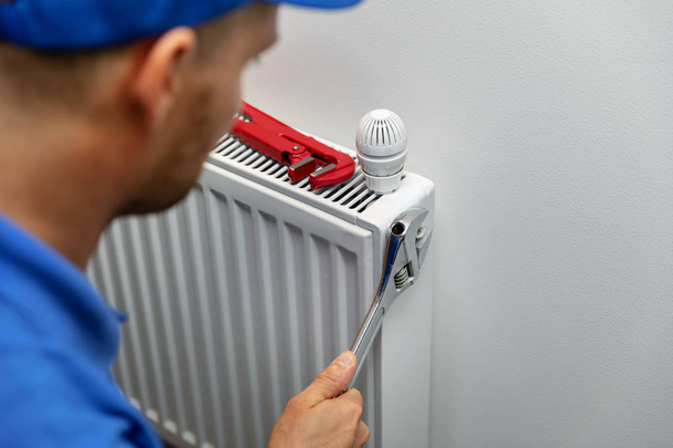 heating system installation and maintenance service. plumber ins - Photo, Image