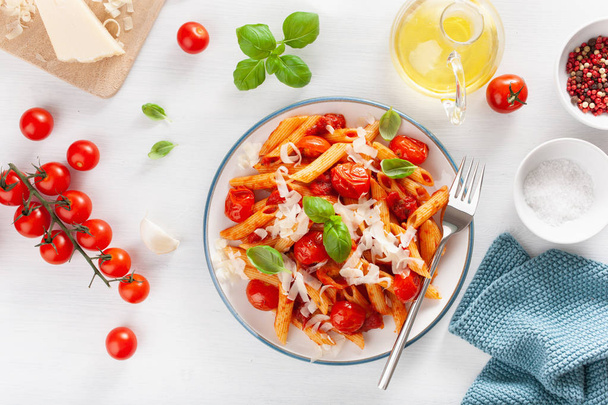 italian penne pasta with tomatoes parmesan basil - Photo, Image