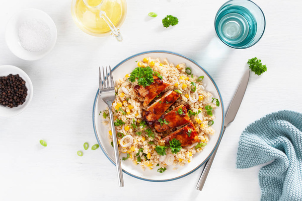 roasted bbq chicken with couscous sweetcorn onion, healthy lunch - Foto, immagini