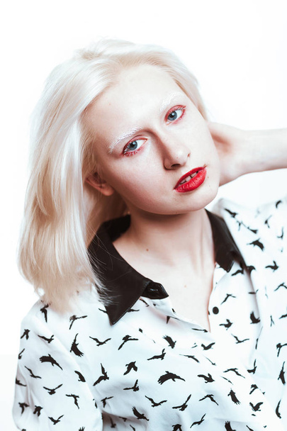 portrait blonde albino girl in studio on white background - Фото, зображення