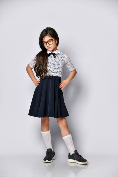 Girl cute schoolgirl in uniform - Photo, Image