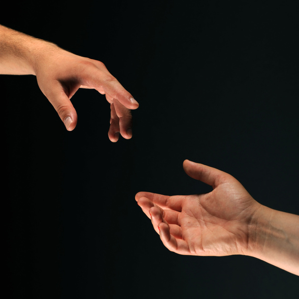 két kezét egymáshoz elérése - Fotó, kép